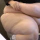 A morbidly obese woman sits down on a toilet and takes a shit and a piss. Grunting and several plops are heard. There is a video flaw at 3:30 minutes into the clip, but does not take away from the actual poop and pee action. 720P HD.  About 5.5 minutes.